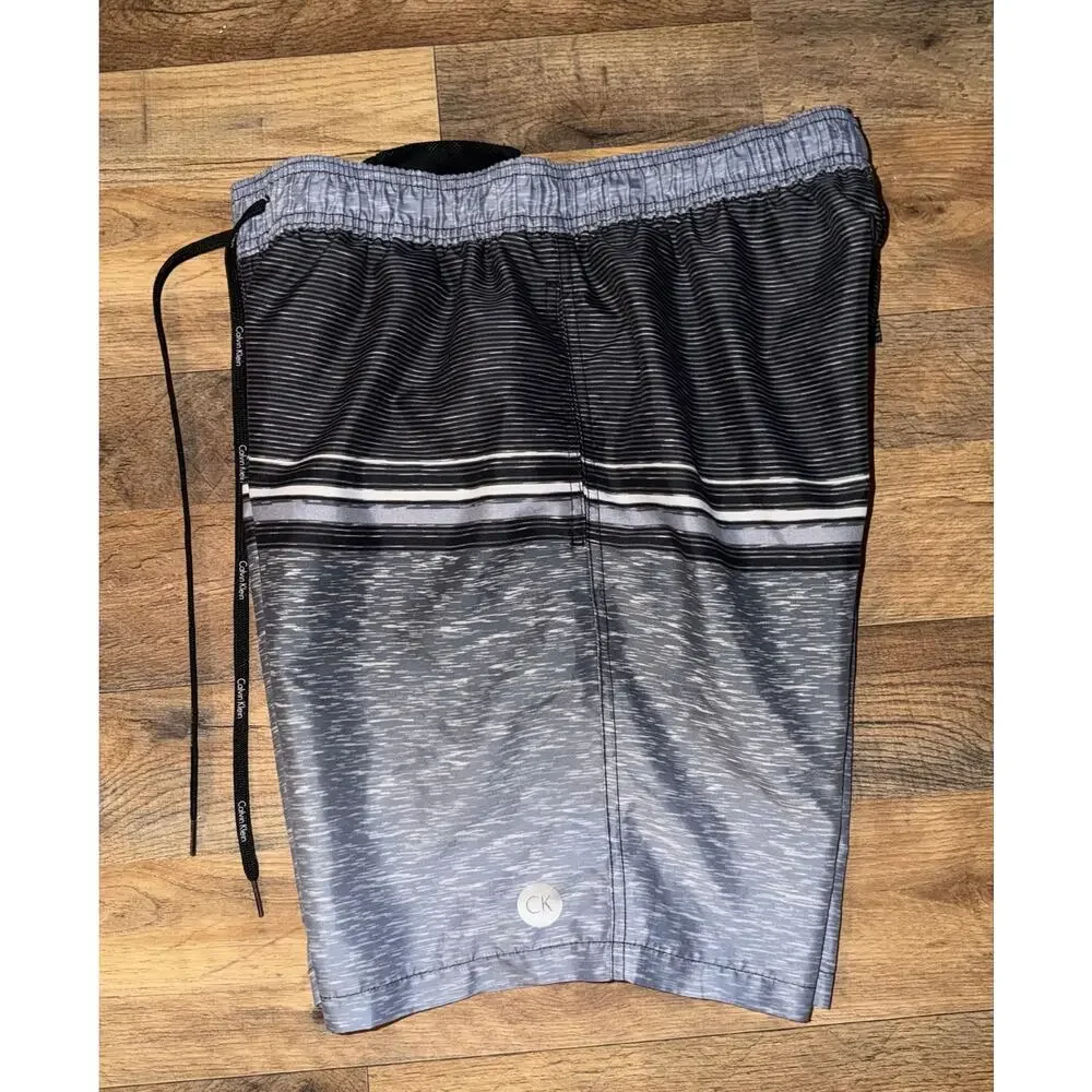 Calvin Klein men’s grey& black swim trunks
